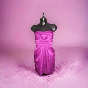 Gorgeous Three Wishes strapless tie-back dress in size xs pleated front pockets